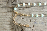 Peruvian opal and blue chalcedony gold necklace.