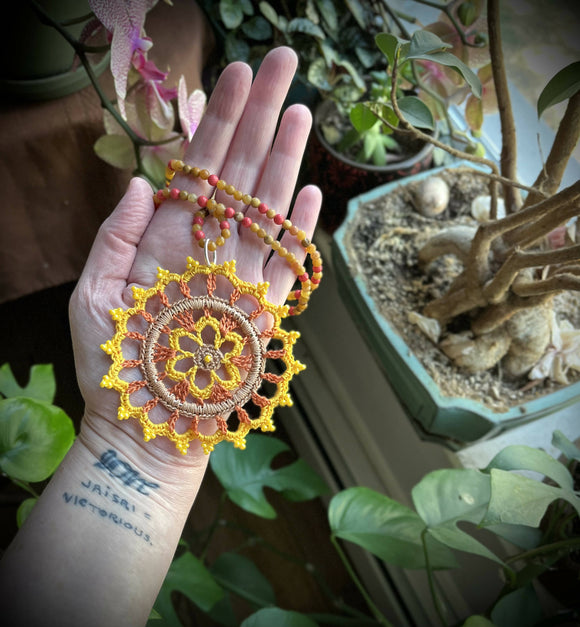 Handmade beaded mandala necklace