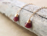 Ruby gold long chain dangle artisan earrings. July birthstone gift for women.
