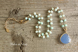 Peruvian opal and blue chalcedony gold necklace.